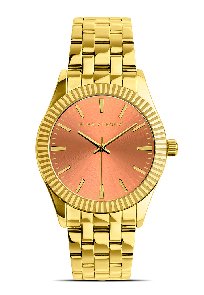 Reloj dorado para mujer con esfera de color coral.